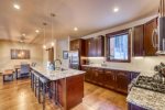 Expansive kitchen with granite countertops